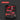 Red tool set in a black case on a dark background