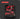 Red tool set in a black case on a dark background