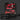 Set of red tools in a black storage case on a dark background
