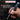 A hand holding a digital multimeter screwdriver tool with a silver and black body, blue display, and metal probe tip. Text overlays highlight '100W OUTPUT' and 'PRECISE TEMPERATURE CONTROL FOR ELECTRONICS, DIY PROJECTS, AND PROFESSIONAL REPAIRS'.