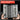 128-in-1 Electronics & Gadget Toolkit held by a hand with a black background