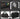 Black tool bag with multiple compartments and features highlighted on a dark background