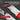 Knife with one-click blade replacement mechanism on a dark background