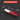 Red and gray dual-purpose tool with labeled parts on a black background