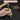 Hand holding a green tool with a hammer above, labeled 'Maximum Impact' and 'For precise work on bolts, pins, and metal components'.