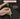 Hand holding a green tool with a hammer above, labeled 'Maximum Impact' and 'For precise work on bolts, pins, and metal components'.