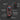 Laser measuring device with labeled components on a dark background