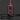 Red and black laser distance meter on a dark background with text highlighting features.