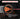 360-degree laser leveling system with orange and black design, projecting a full-circle guide.