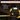 Laser measure with tape extension on a dark background, highlighting its features.