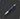 Blue pen with silver accents on a dark background