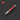 Red pen with silver accents on a black background