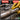 A split-screen comparison labeled BEFORE and AFTER showing a metal tube being cleaned or treated. The left side shows a rusty, dull metal tube on a workbench with tools in the background.