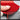 A close-up of a red flexible triangular felt-like material being held by fingers, with a dark overlay panel listing product characteristics such as electroplated diamond surface, flexible triangle design, soft nylon hook & loop backing, available grits, and ultra-thin working layer.