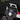 Black and red device with Type-C charging feature on a dark background