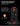 Black and red electronic device with audio broadcast features on a black background