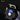 Black power switch with blue LED indicator on a dark textured background