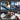 Collage of people repairing electronic devices with 132 in 1 with text indicating services like phone repair, electronic restoration, computer repairs, and gadget repair.