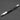 Multifunctional pen with ruler and level on a gray background