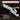Multitool with built-in screwdriver on a dark background