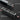 A 3D-rendered close-up of a multi-card card reader or SIM-eject device shown twice on a dark gray background, with callout labels reading 'SNAP AT A PRESS,' 'PUSH UP TO EJECT THE HANDLE,' and 'EJECTED.' This is explanatory product imagery rather than a clean standalone product shot, so subject_type is Instruction Diagram.
