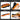 Set of tools with orange handles and black blades, used for various tasks.