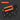 Mechanical combination set with orange and black components on a dark background
