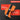 Orange and black tool with embedded lock features on a dark background