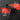 Black cordless drill driver shown on a dark gray background with two red informational callouts reading gear speed ranges and small inset photos of use.