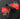 Black cordless drill driver shown on a dark gray background with two red informational callouts reading gear speed ranges and small inset photos of use.