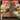 Before and after comparison of a wooden surface being sanded with gloves on.