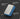 Blue sanding block with text on its uses on a dark background