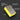 Yellow sanding block with text indicating its use for grinding porcelain and natural stone.