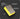Yellow sanding block with text indicating its use for grinding porcelain and natural stone.