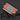 Set of dual-head tools with orange handles and spring-loaded design on a dark background