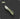 Green folding knife on a dark background