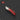 Red pocket knife on a dark background