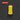 A single yellow cylindrical foam earplug centered on a dark gray background with subtle concentric wave lines. A red label at top left reads “ROUND 1 INCH,” and “1.