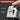 Close-up of a tape measure with auto-locking system features highlighted on a dark background.