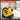 Yellow tape measure with text about precision accuracy on a blurred room background
