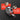 Tape measure with laser rangefinder feature on a black background