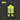 Yellow safety vest with reflective stripes on a dark background