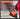 A promotional graphic for a sanding kit showing an orange and black angle grinder in use with a red work glove, over a light wood surface. A large semi-transparent dark gray text box on the left lists characteristics: complete 65-piece value pack, dual-design sanding kit, effortless hook and loop backing, industrial-grade chrome and PU backing, and premium material construction.