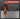 Orange and black tool with features listed on a gray background