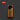 Three yellow markers with gray caps in an orange holder on a dark background