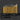 Set of yellow metal tools with hexagonal bodies on a dark background