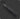 Black utility knife on a dark background