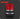 Red and black safety vest with reflective stripes on a dark background
