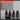 Five black metal thread conversion adapters displayed on a dark surface against a gray background, with a red and gray 'CHARACTERISTICS' panel listing features such as universal thread conversion, wide compatibility, durable metal construction, quick and easy installation, and multiple adapter options.