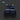 Blue tactical vest with multiple pockets on a dark background